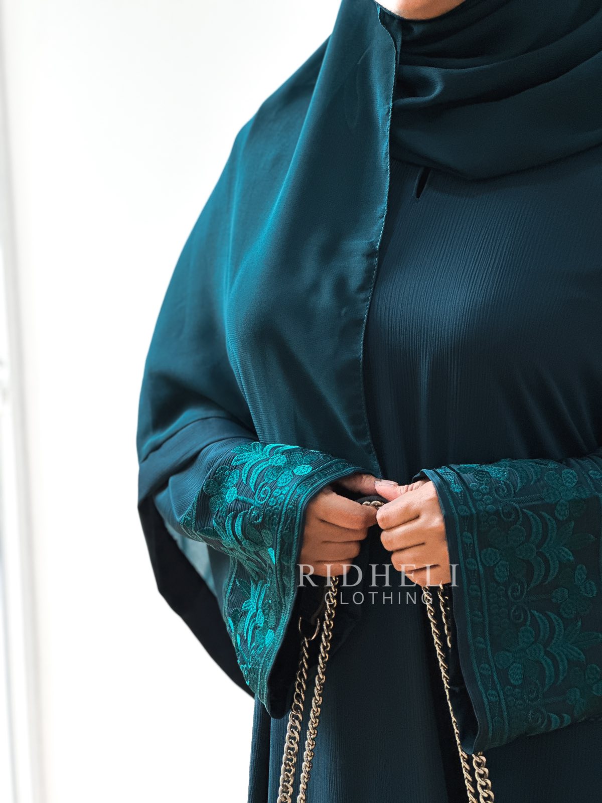 NAAZ TEAL EMBROIDERY ABAYA